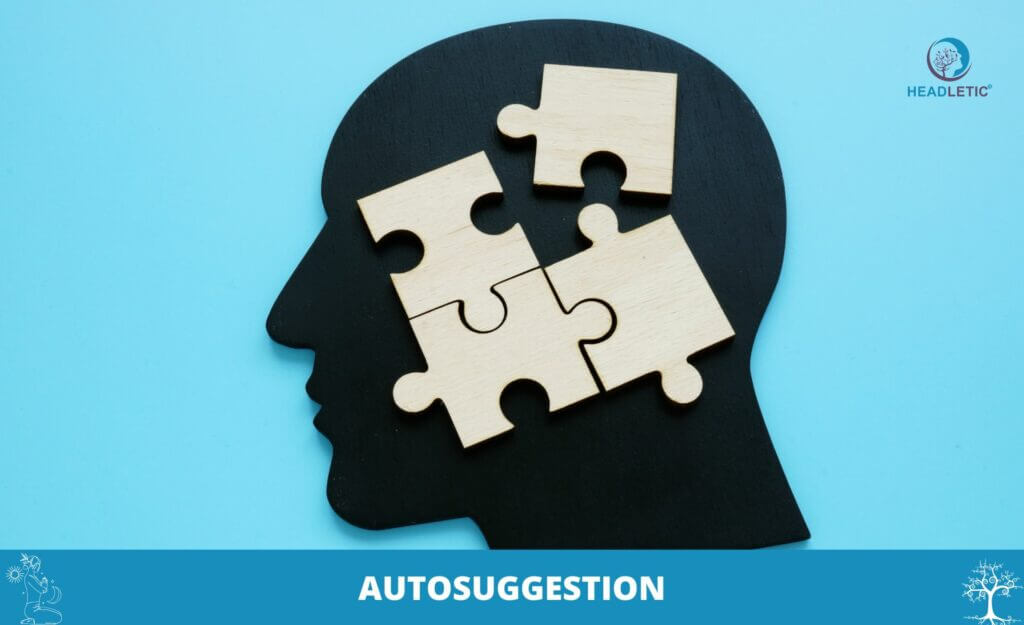 Die Silhouette eines Kopfes mit fehlenden Puzzleteilen weist subtil auf das Konzept der „AUTOSUGGESTION“ hin und integriert die Kraft der bewussten Selbstkommunikation.